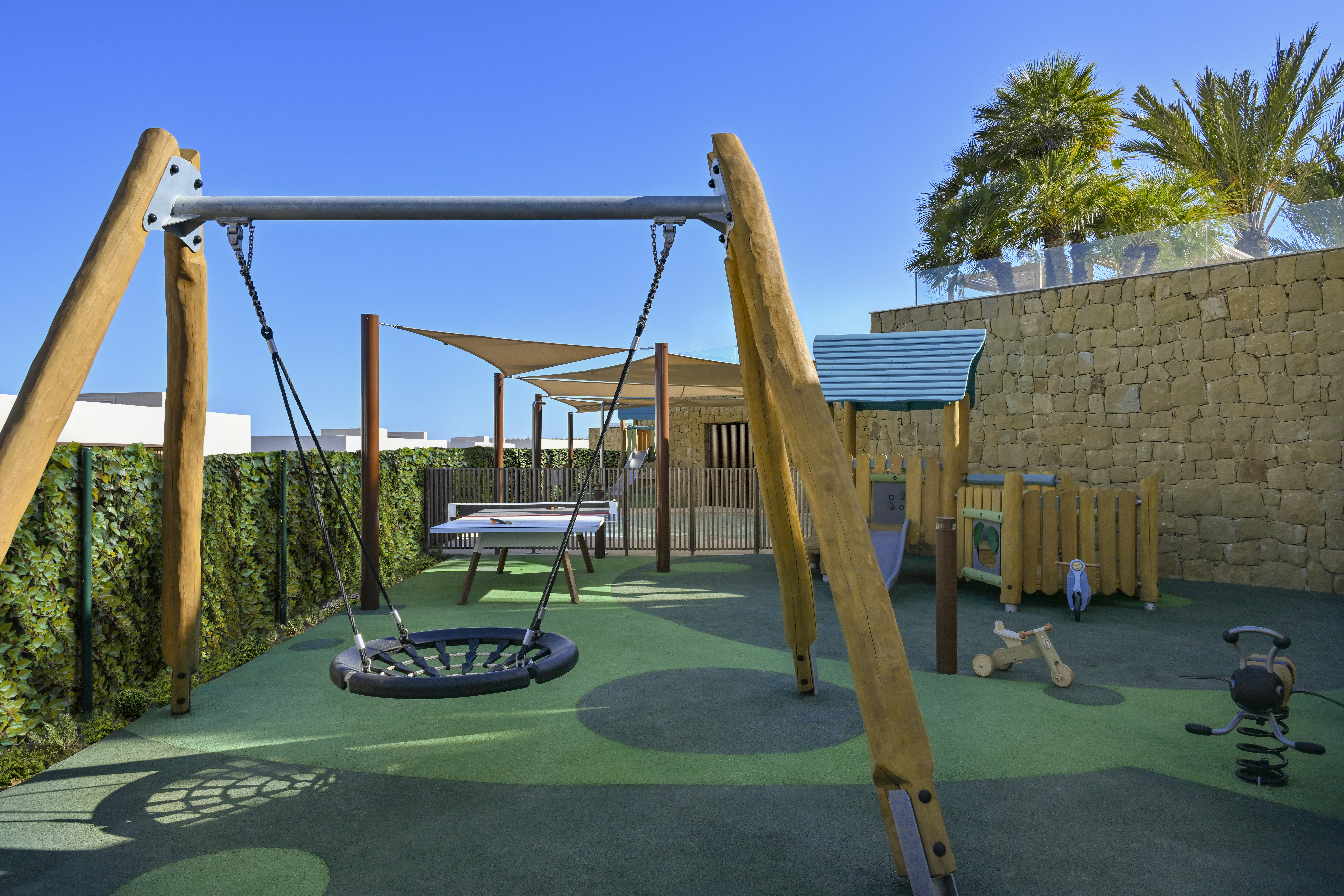 Fairmont La Hacienda Costa del Sol Kids Club and Teens Club outdoor play area and splash zone luxury family resort Costa del Sol Spain