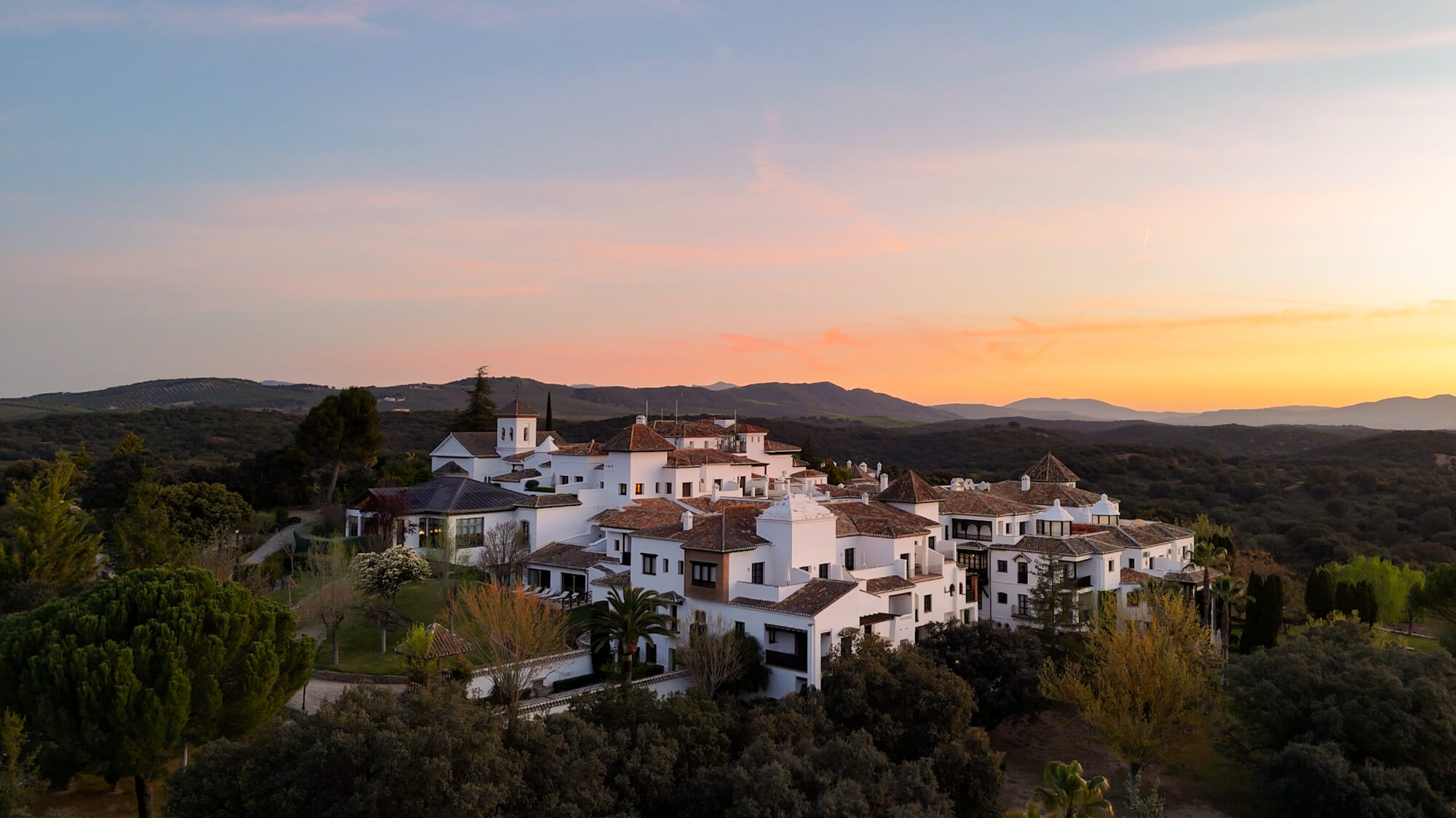 Finca La Bobadilla Andalusia historic estate with olive groves and Andalusian village architecture, luxury family hotel in Granada Spain