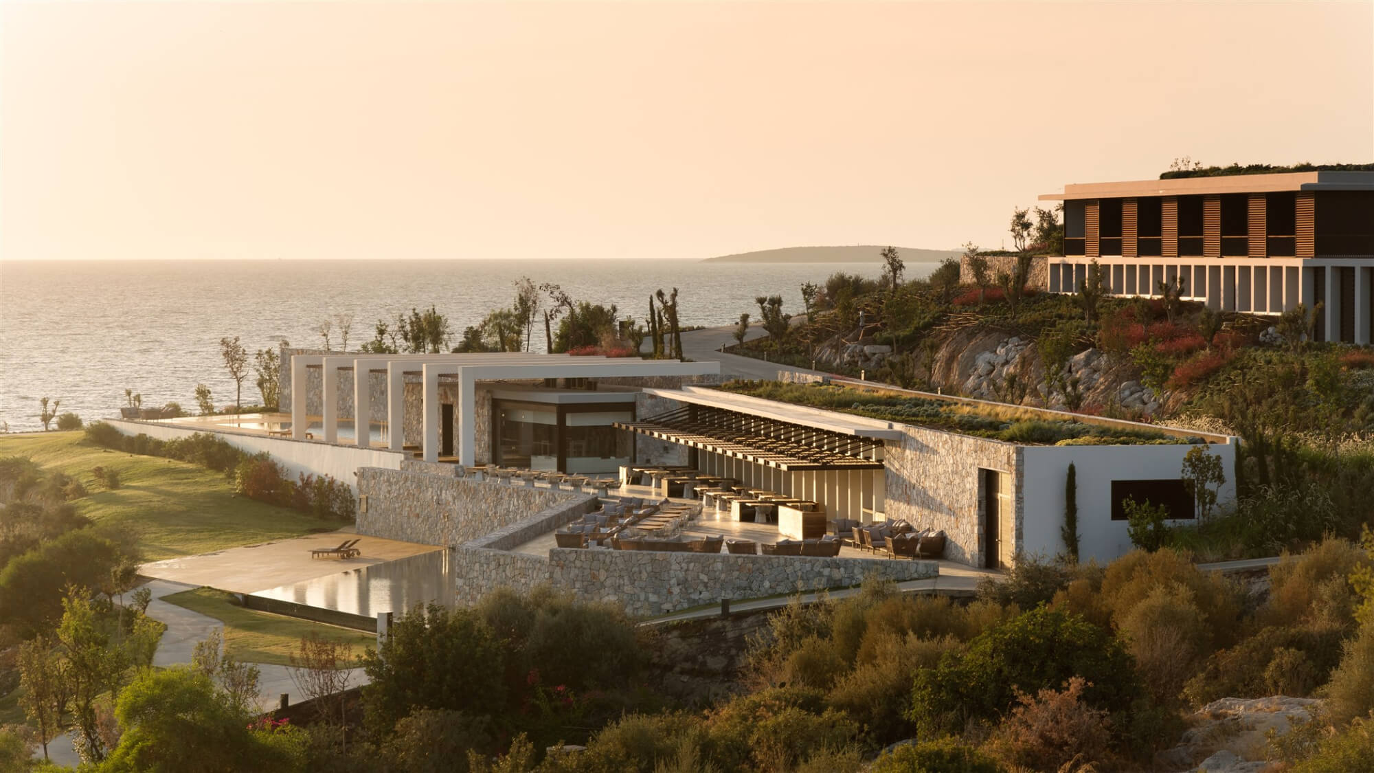 Six Senses Kaplankaya Aegean coastline with cypress hills and stunning sea views, luxury family wellness resort in Bodrum Turkey